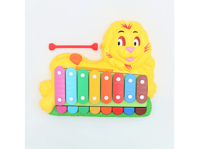 Little cute lion infant playing music piano toy